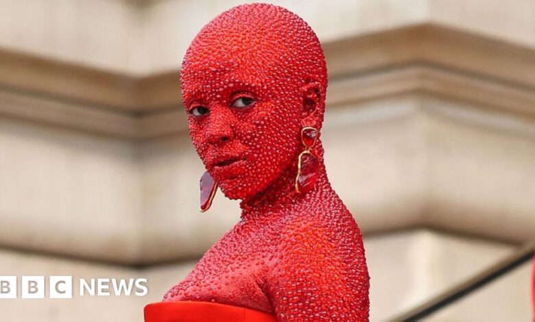 Doja Cat turns heads in red body paint and 30,000 crystals at Schiaparelli's Paris show