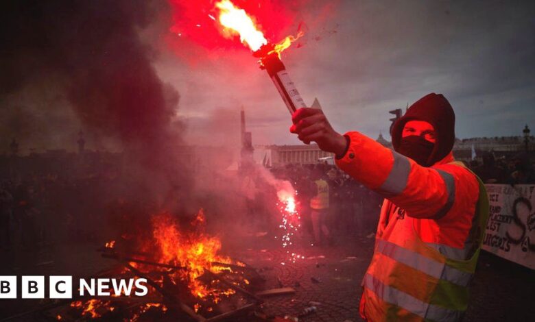 France pension protests: Clashes after Macron orders rise in pension age without vote