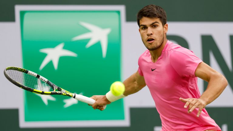 Carlos Alcaraz returns a shot against Jannik Sinner during the 2023 BNP Paribas Open at Indian Wells. Pic: Associated Press