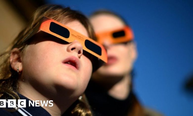 Solar eclipse: Thousands flock to remote Australian town for rare celestial event