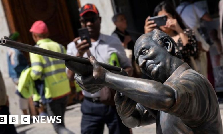 Statue mocking Spain's ex-king Juan Carlos appears in Madrid