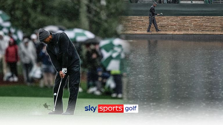 Tiger Woods currently lies bottom of the Masters leaderboard after finding the water twice on the rain-soaked course at Augusta