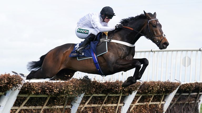 Constitution Hill and Nico De Boinville jump the last in the Aintree Hurdle