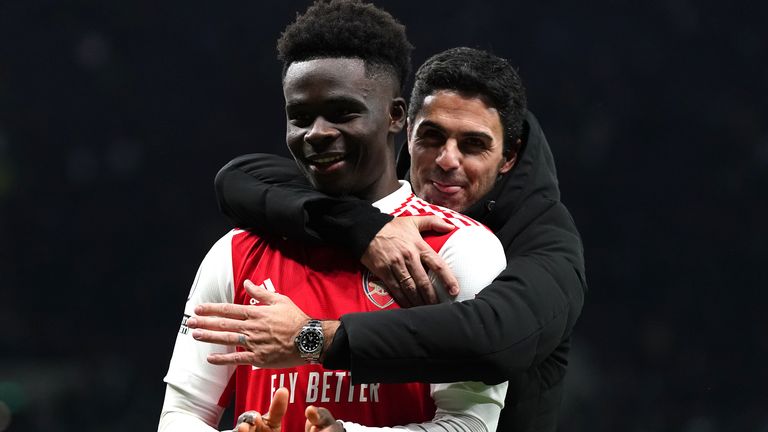 Bukayo Saka and Mikel Arteta